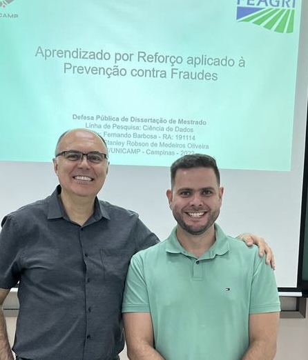 Fernando with another participant after his thesis defense
